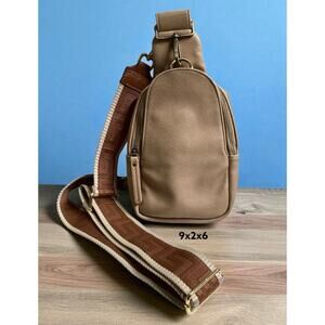 Urban Originals Anthropologie Sling Bag in the color in beige